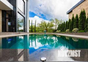 Коттедж 353м², 3-этажный, участок 5 сот.