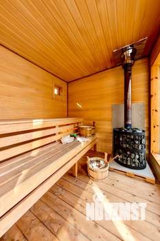 Коттедж 200м², 3-этажный, участок 5 сот.