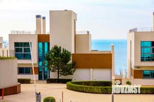 Коттедж 968м², 4-этажный, участок 8 сот.