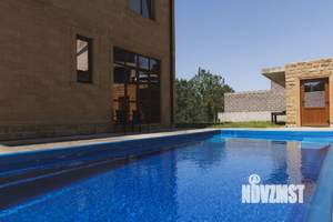 Коттедж 330м², 3-этажный, участок 7 сот.