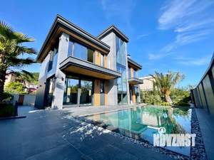 Коттедж 300м², 3-этажный, участок 7 сот.