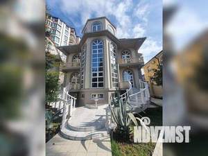 Коттедж 611м², 4-этажный, участок 12 сот.