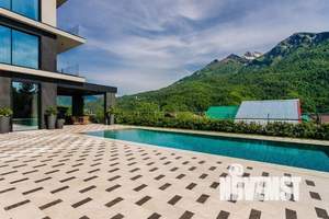 Коттедж 490м², 3-этажный, участок 11 сот.  