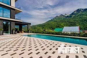 Коттедж 490м², 3-этажный, участок 11 сот.  