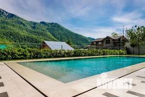 Коттедж 490м², 3-этажный, участок 11 сот.  