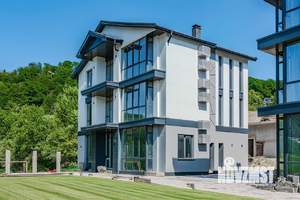 Коттедж 288м², 3-этажный, участок 5 сот.  