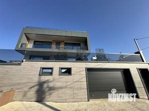 Коттедж 294м², 3-этажный, участок 5 сот.  