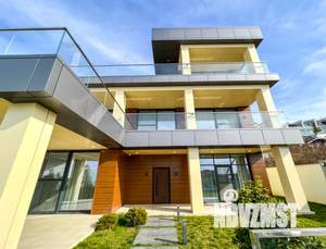 Коттедж 560м², 3-этажный, участок 7 сот.  