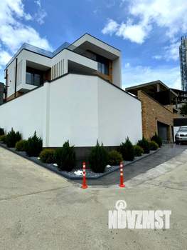 Коттедж 298м², 3-этажный, участок 5 сот.  