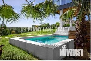 Коттедж 400м², 3-этажный, участок 7 сот.  