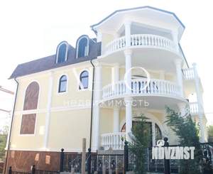 Коттедж 606м², 4-этажный, участок 7 сот.  