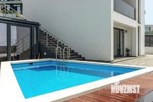 Дом 330м², 3-этажный, участок 10 сот.  