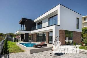 Дом 210м², 2-этажный, участок 12 сот.  