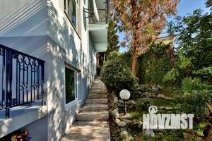 Коттедж 445м², 2-этажный, участок 10 сот.  