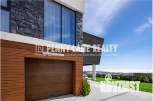 Коттедж 400м², 3-этажный, участок 7 сот.  