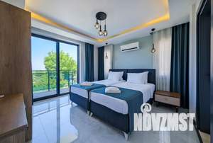 Коттедж 480м², 3-этажный, участок 5 сот.  