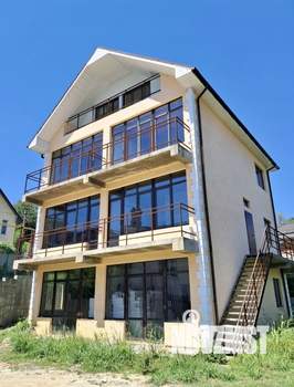 Коттедж 350м², 4-этажный, участок 6 сот.  