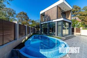 Коттедж 297м², 3-этажный, участок 7 сот.  