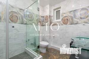 Коттедж 305м&sup2;, 3-этажный, участок 12 сот.  