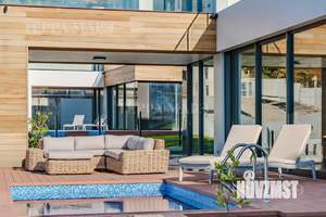 Коттедж 448м², 3-этажный, участок 8 сот.  