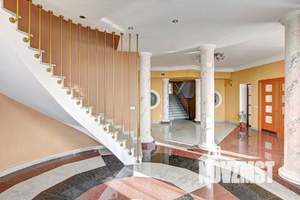 Коттедж 1500м², 4-этажный, участок 12 сот.  