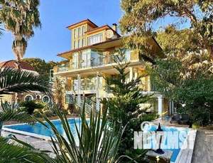 Коттедж 570м², 3-этажный, участок 20 сот.  