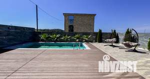 Коттедж 258м², 3-этажный, участок 5 сот.  