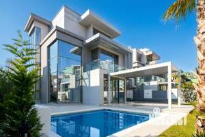 Коттедж 300м², 3-этажный, участок 7 сот.  