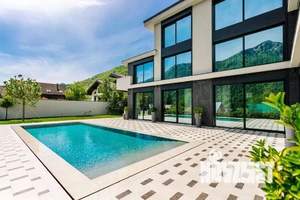 Коттедж 490м², 3-этажный, участок 11 сот.  