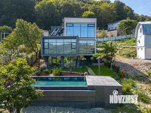 Коттедж 420м², 3-этажный, участок 20 сот.  