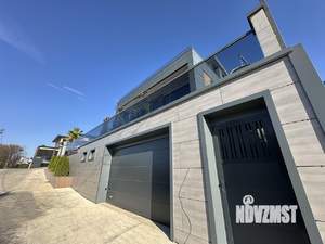 Коттедж 294м², 3-этажный, участок 5 сот.  